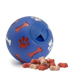 Anti-stress dog ball TREAT BALL releases treats when rolling
